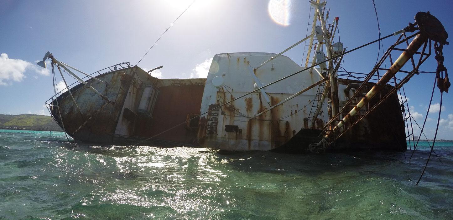 Derelict vessel on coral reef