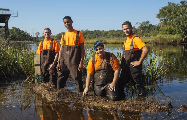 Young volunteers enhancing a wetland