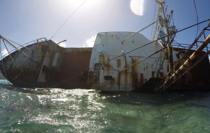 Derelict vessel on coral reef